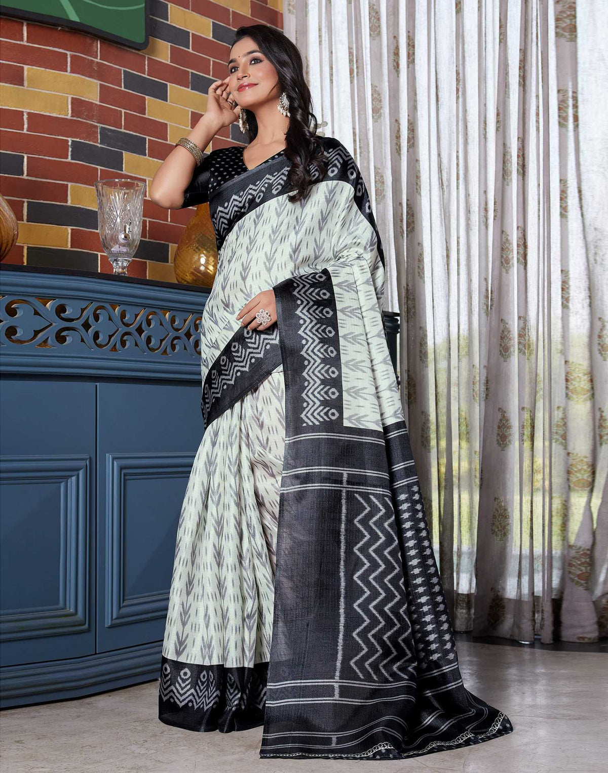 Black Cotton Blend Ikkat Printed Saree