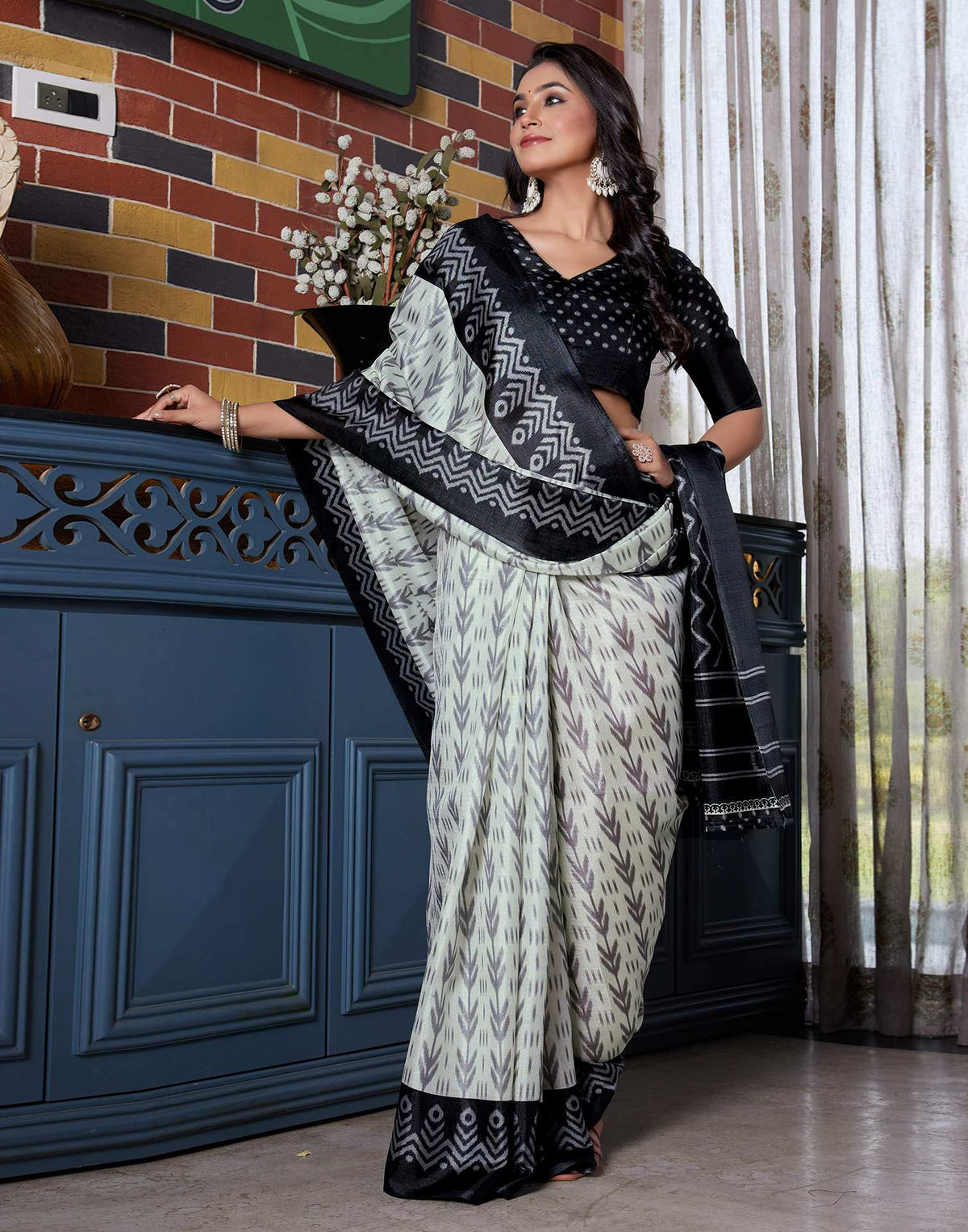 Black Cotton Blend Ikkat Printed Saree