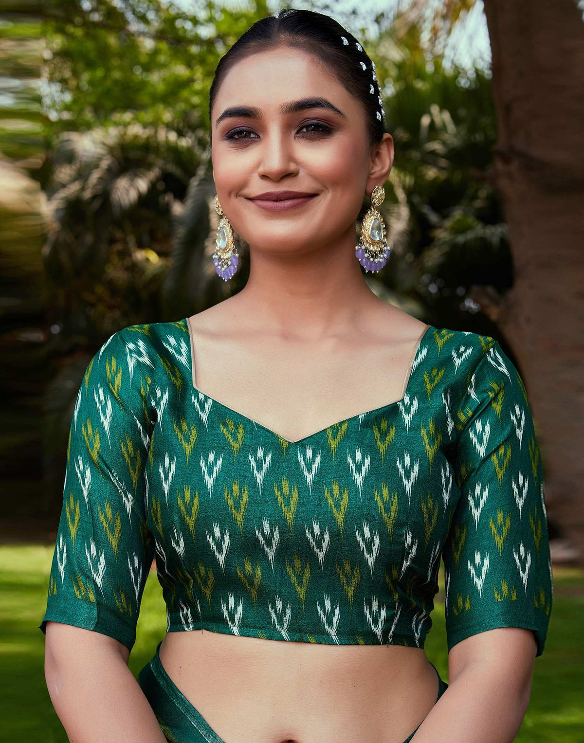 Dark Green Cotton Blend Ikkat Printed Saree