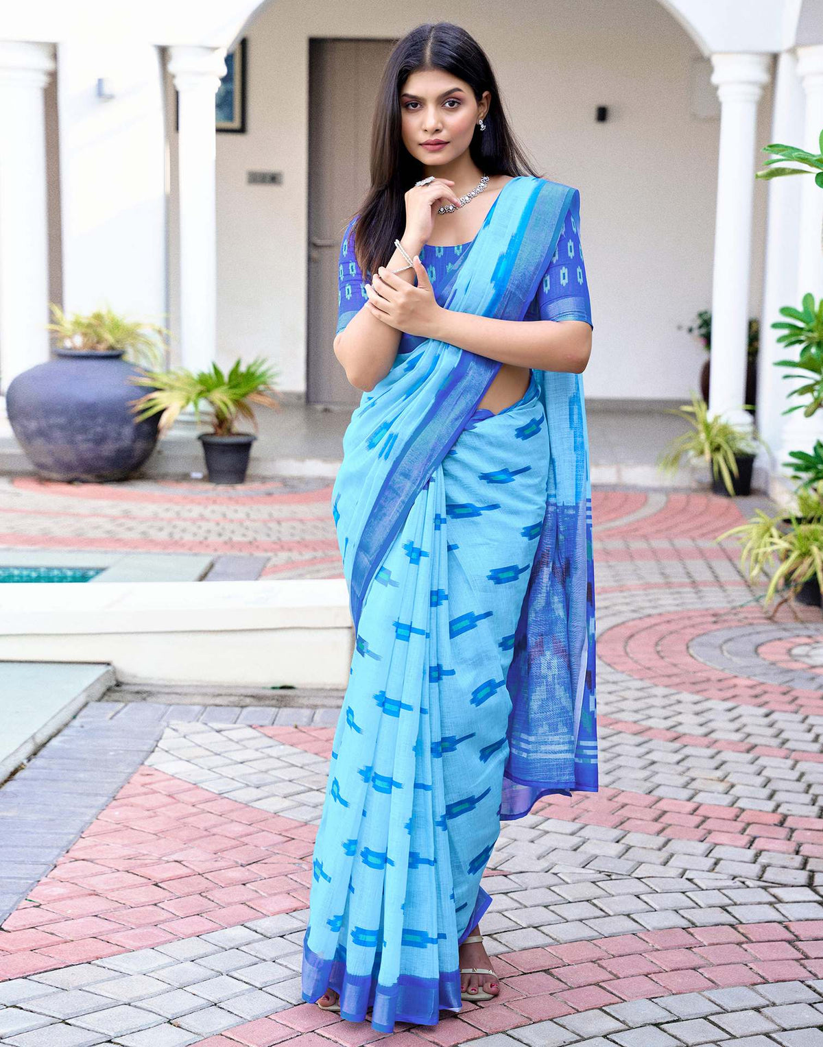 Sky Blue Linen Ikkat Printed Saree