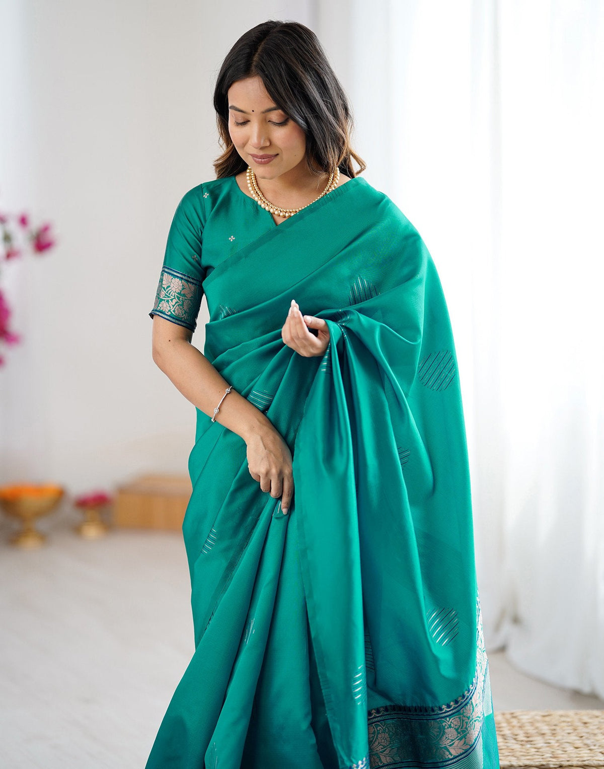 Teal Green Silk Woven Saree